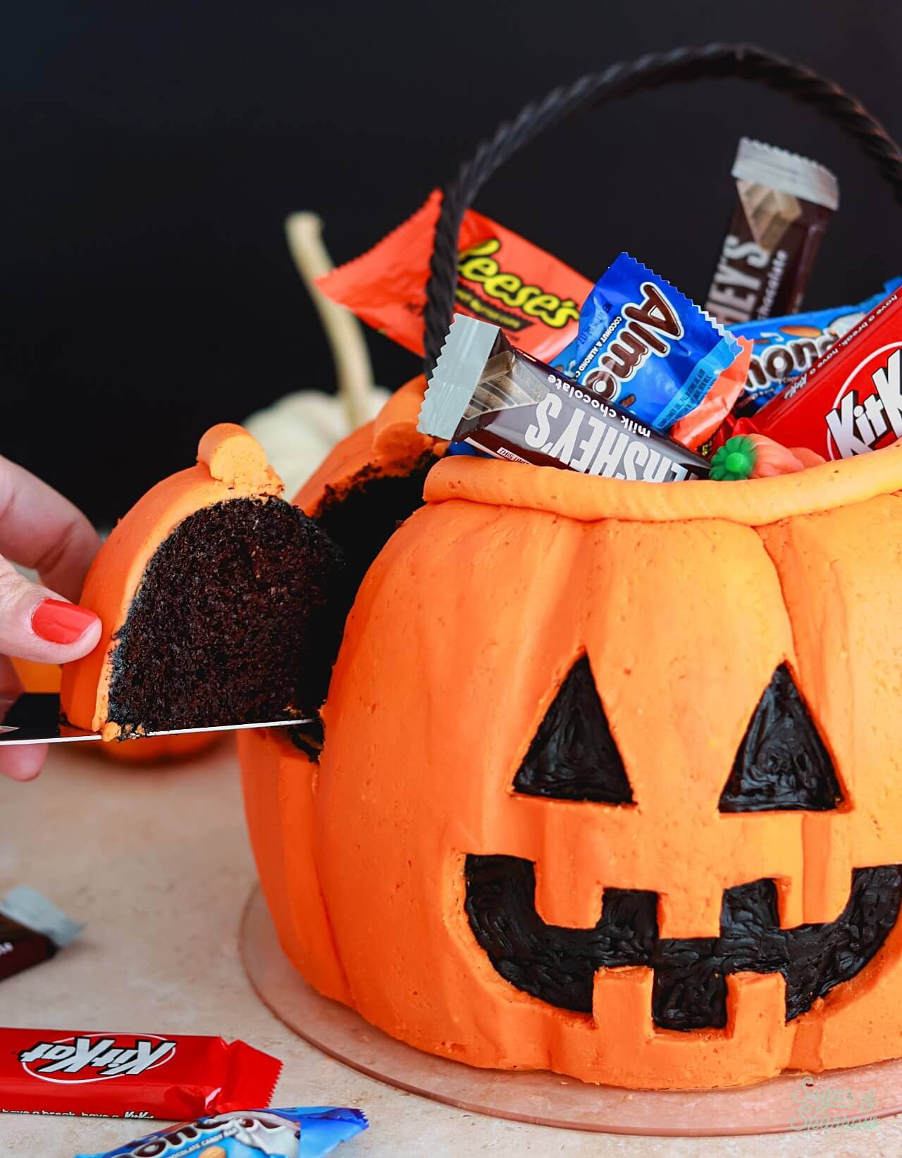 halloween candy bucket cake tutorial with bundt cakes and buttercream