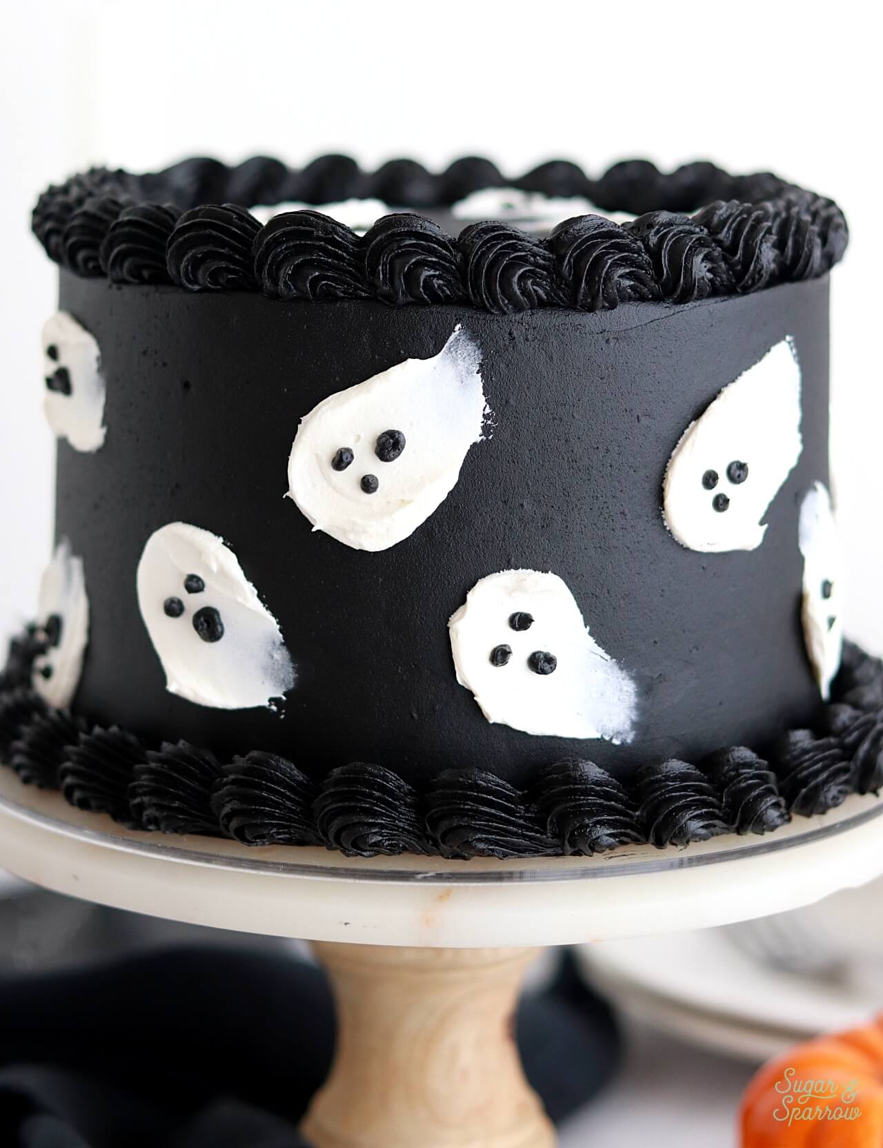 black cake with white ghosts