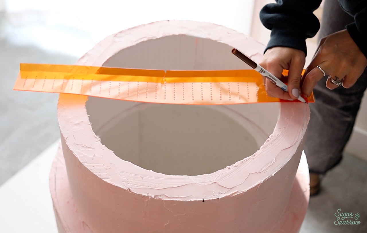 marking out sections on a cake