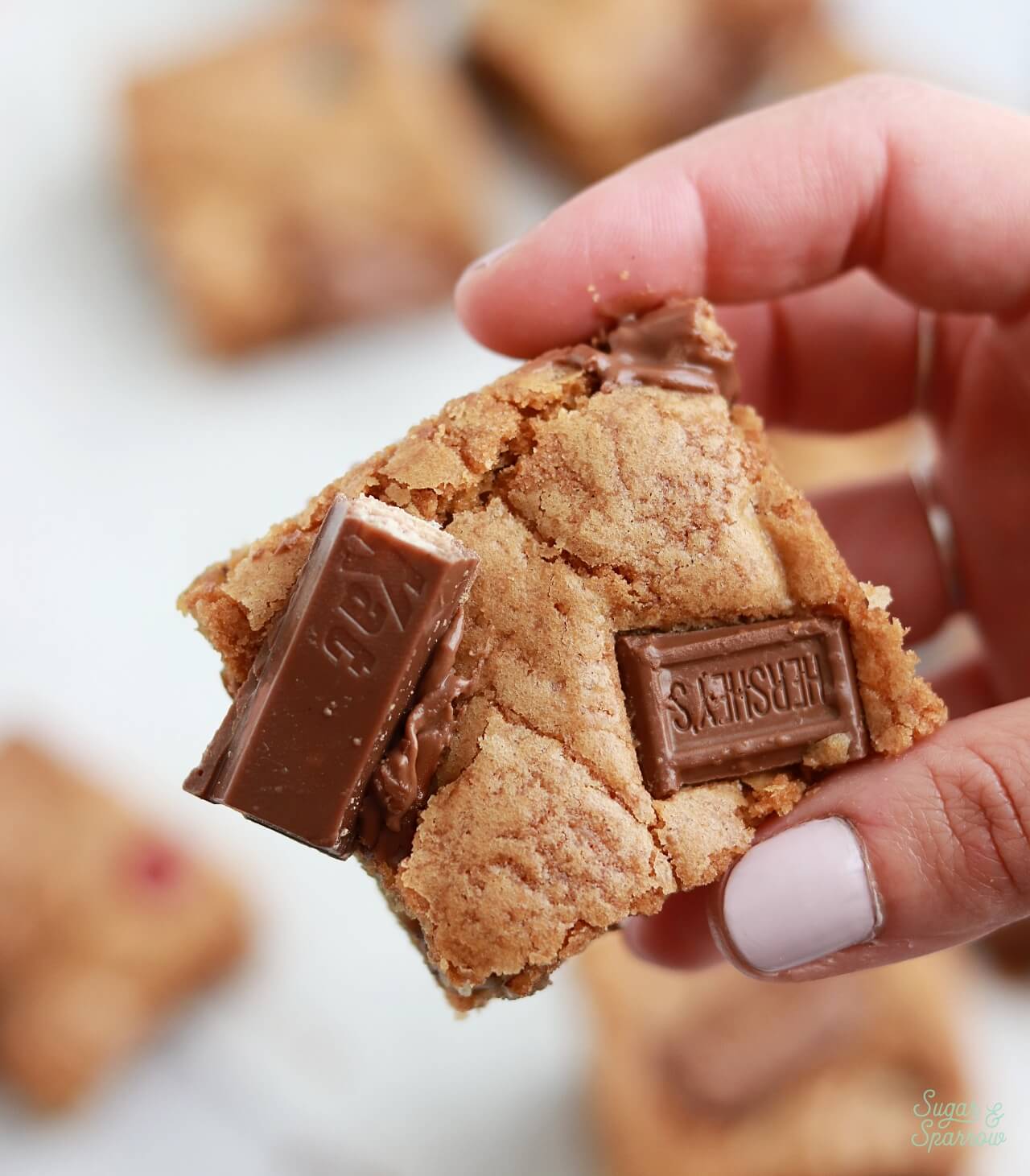 cookie bars with halloween candy folded into the dough
