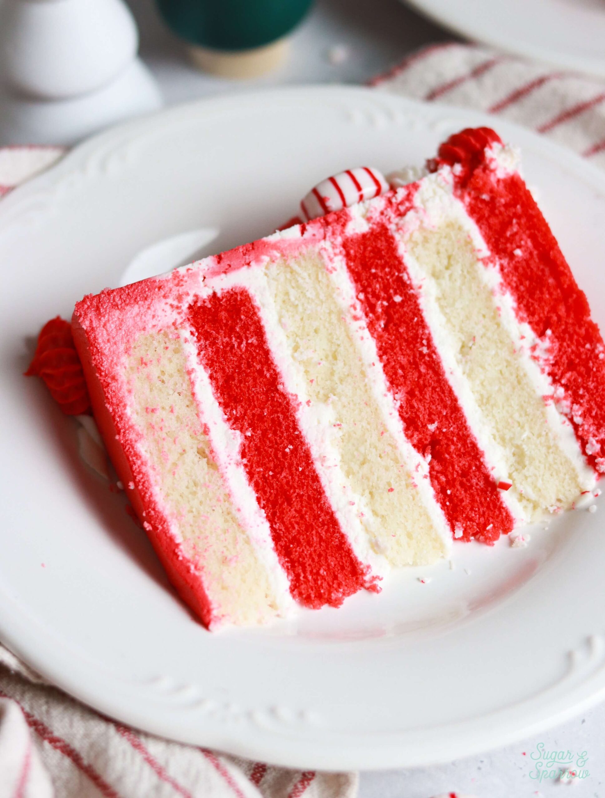 red and white striped candy cane cake slice