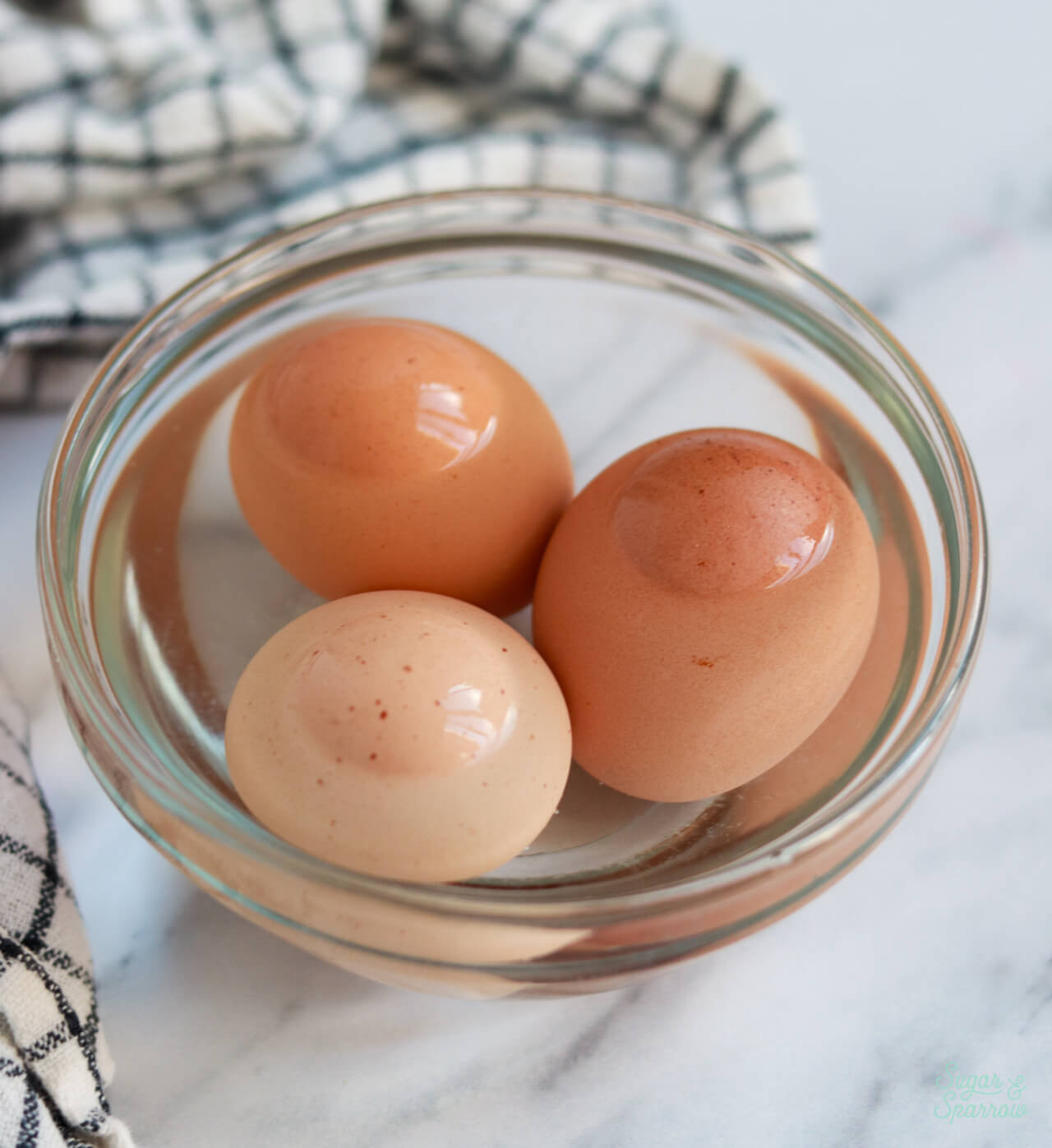 eggs in a bowl of water to reach room temperature quickly