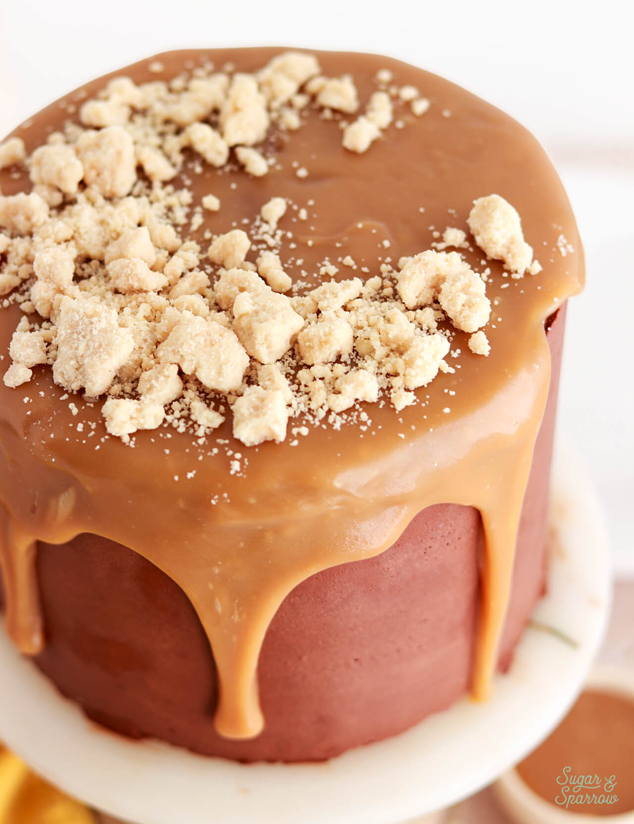 shortbread crumbles on top of cake