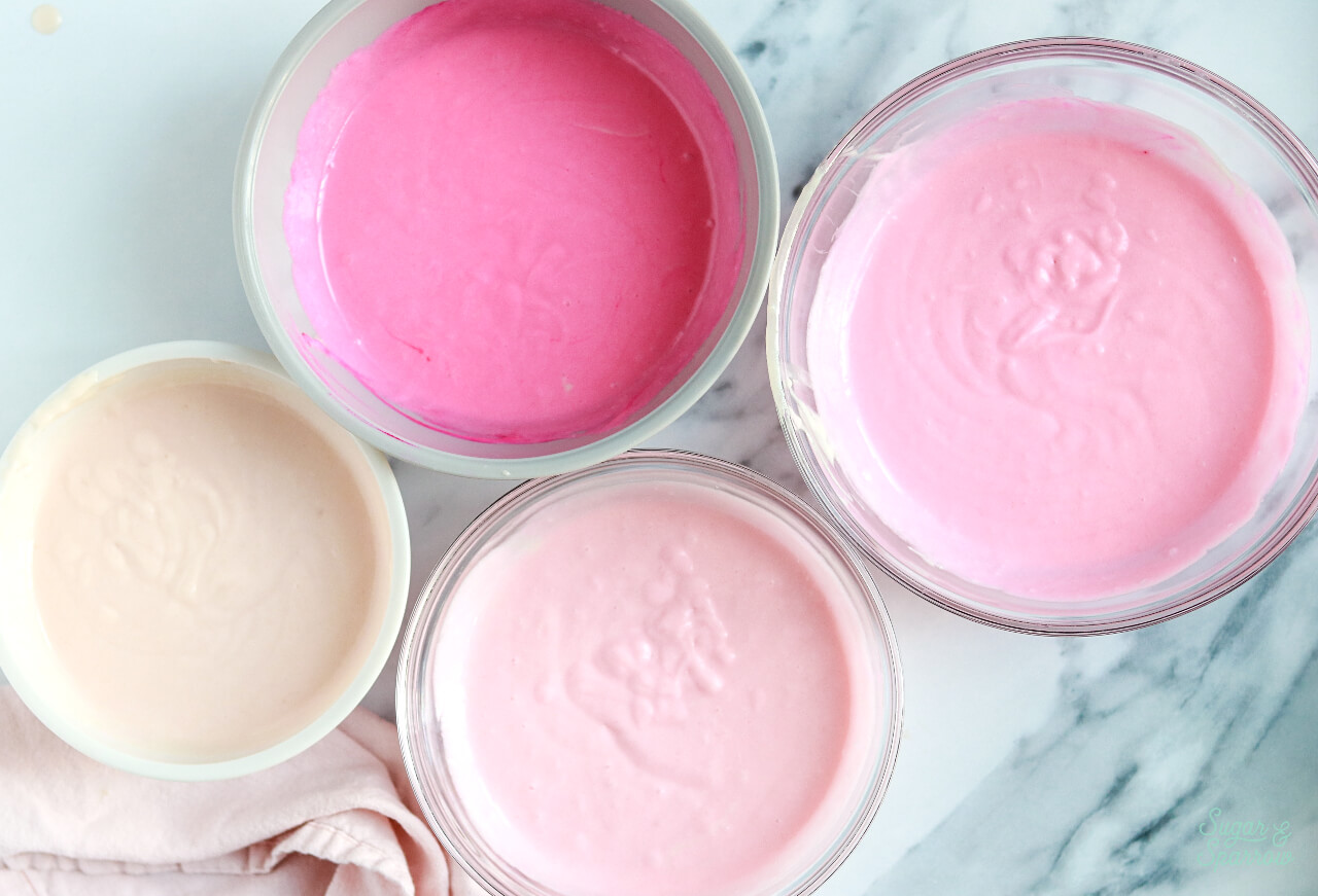 ombre pink cake batter in bowls