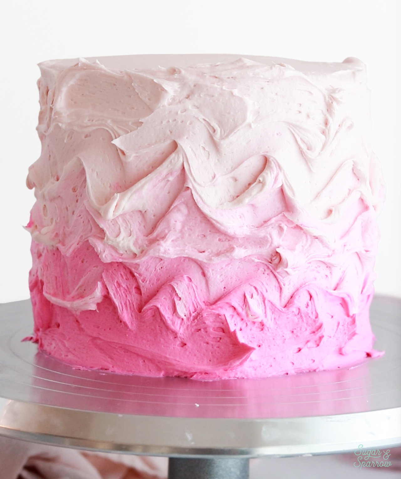 how to frost a cake with pink ombre buttercream