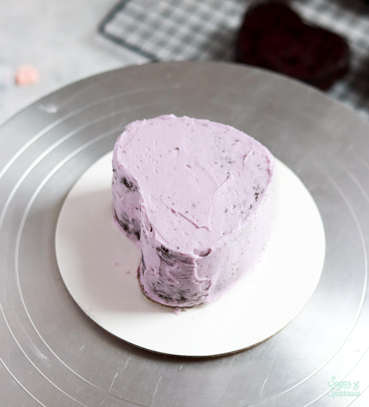 crumb coated heart shaped cake