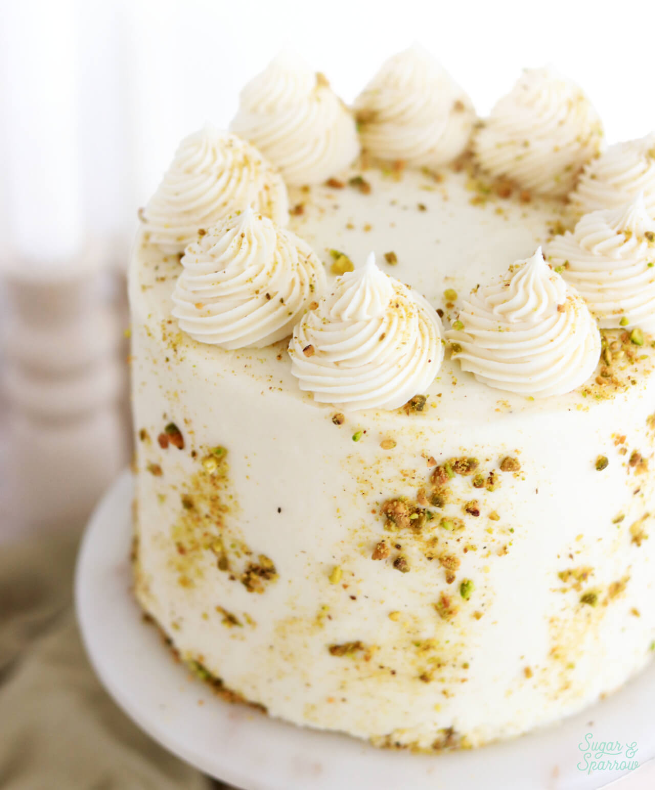 cream cheese frosting on pistachio cake