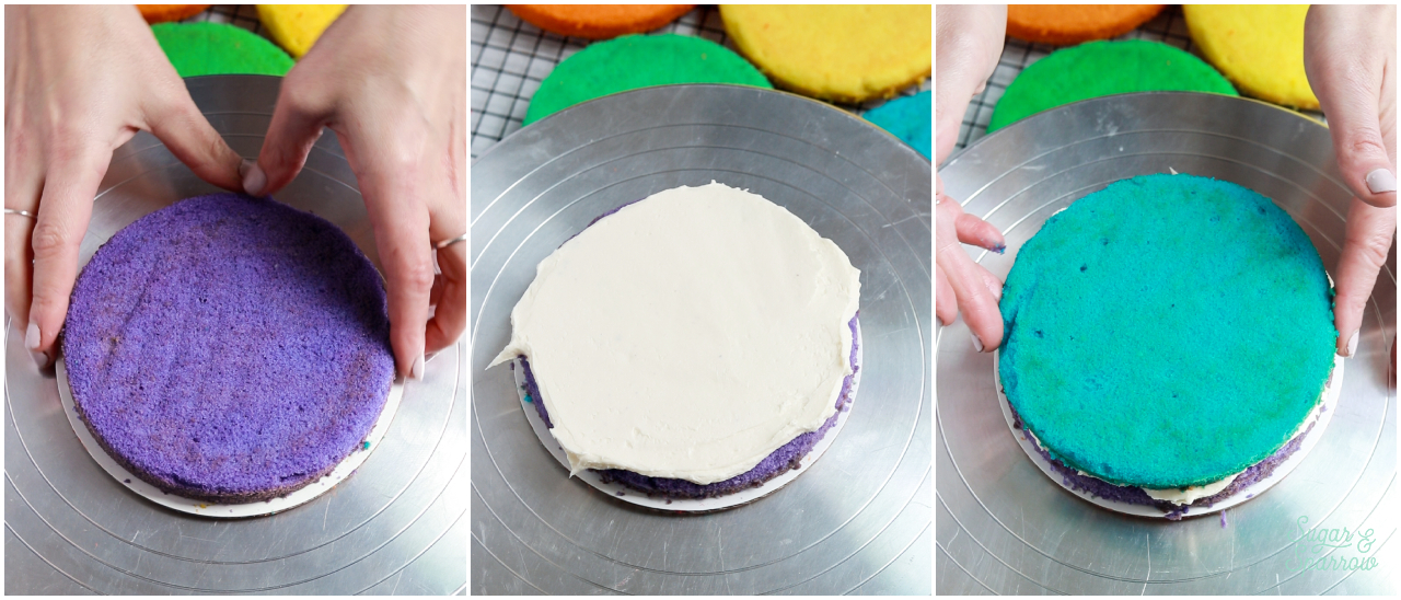 filling and stacking a rainbow layer cake