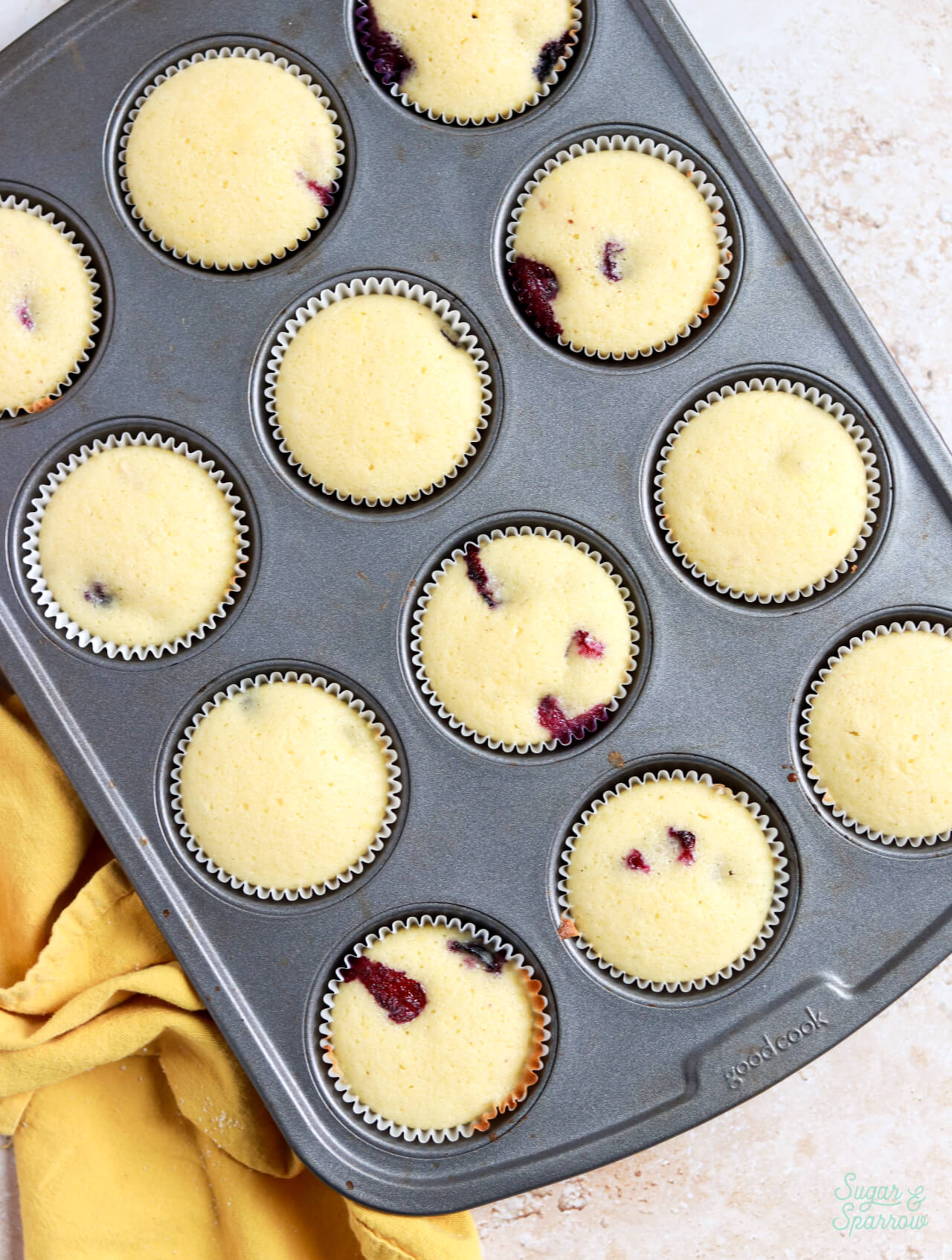 lemon blueberry cupcakes with blueberries that dont sink