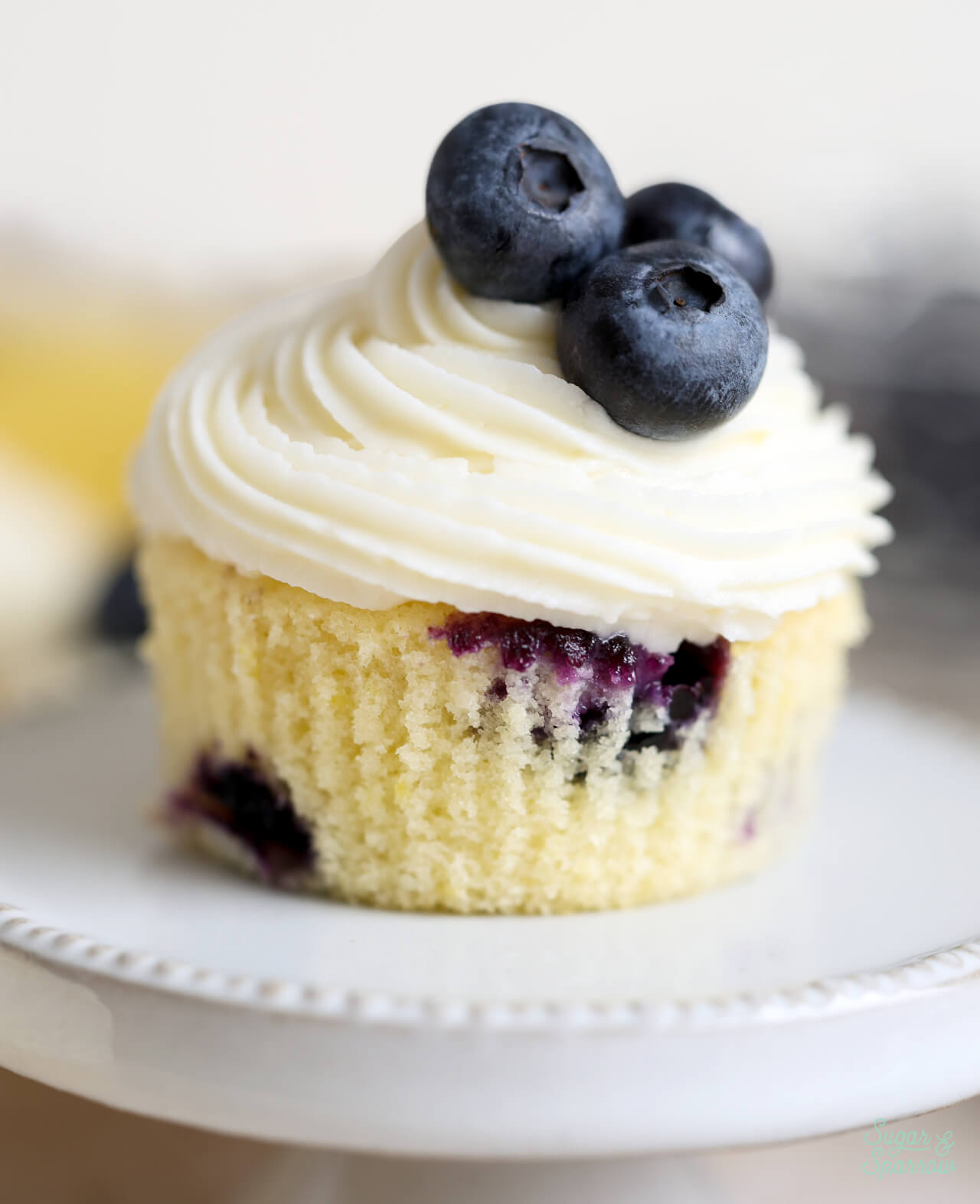 lemon cupcakes with blueberries baked inside