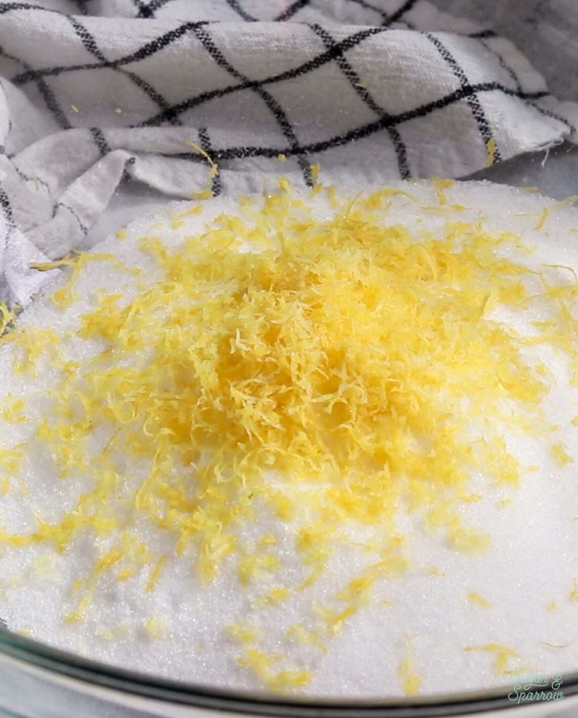 lemon zest mixed with sugar in lemon cake recipe
