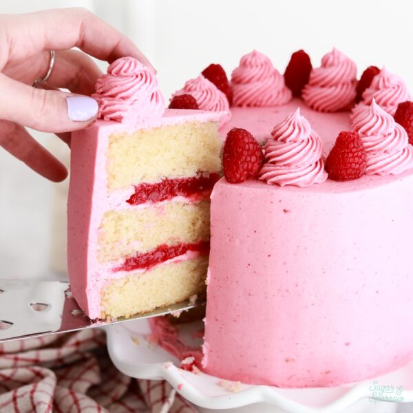 vanilla raspberry layer cake recipe with raspberry filling and raspberry frosting