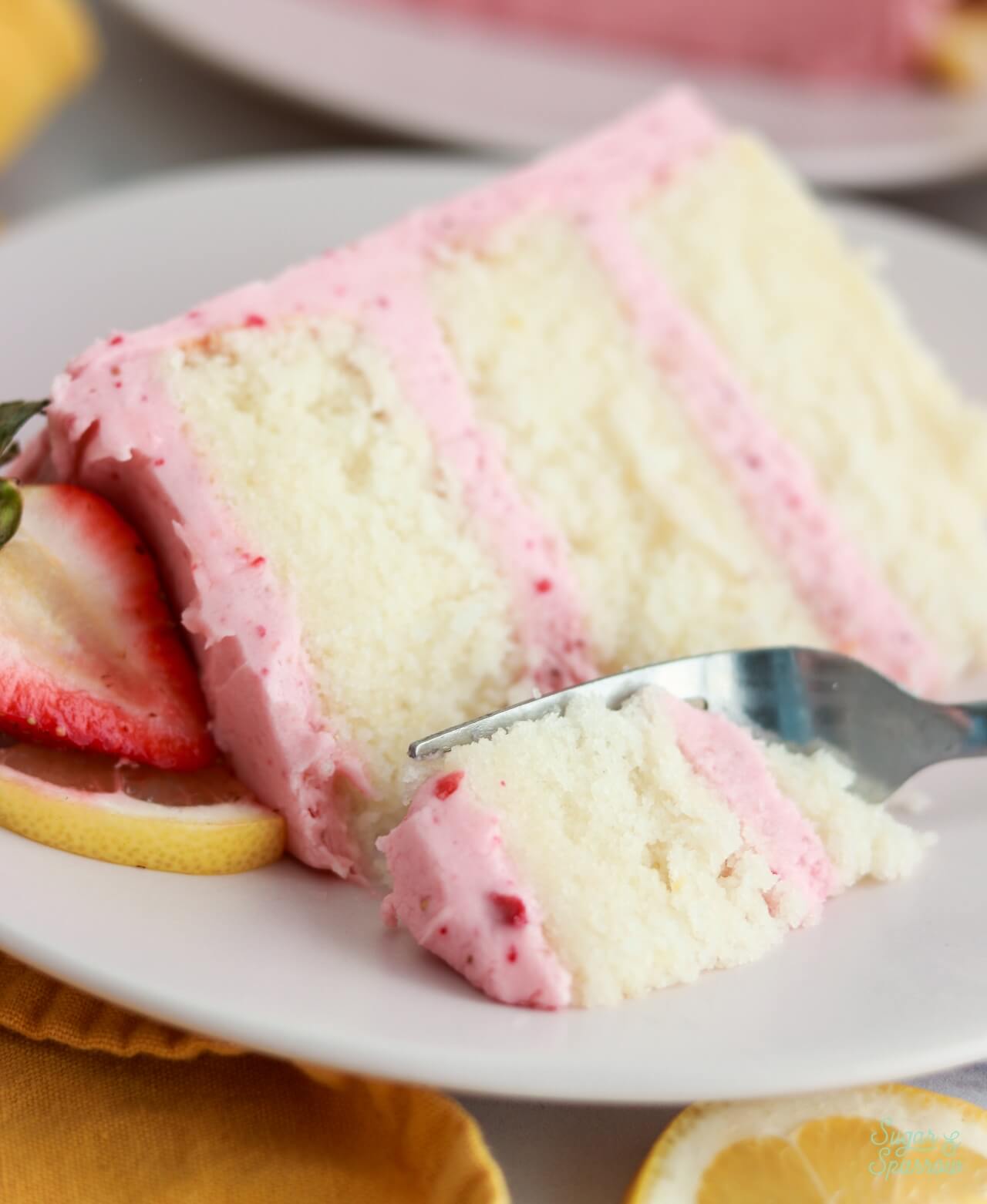 lemon layer cake with strawberry buttercream