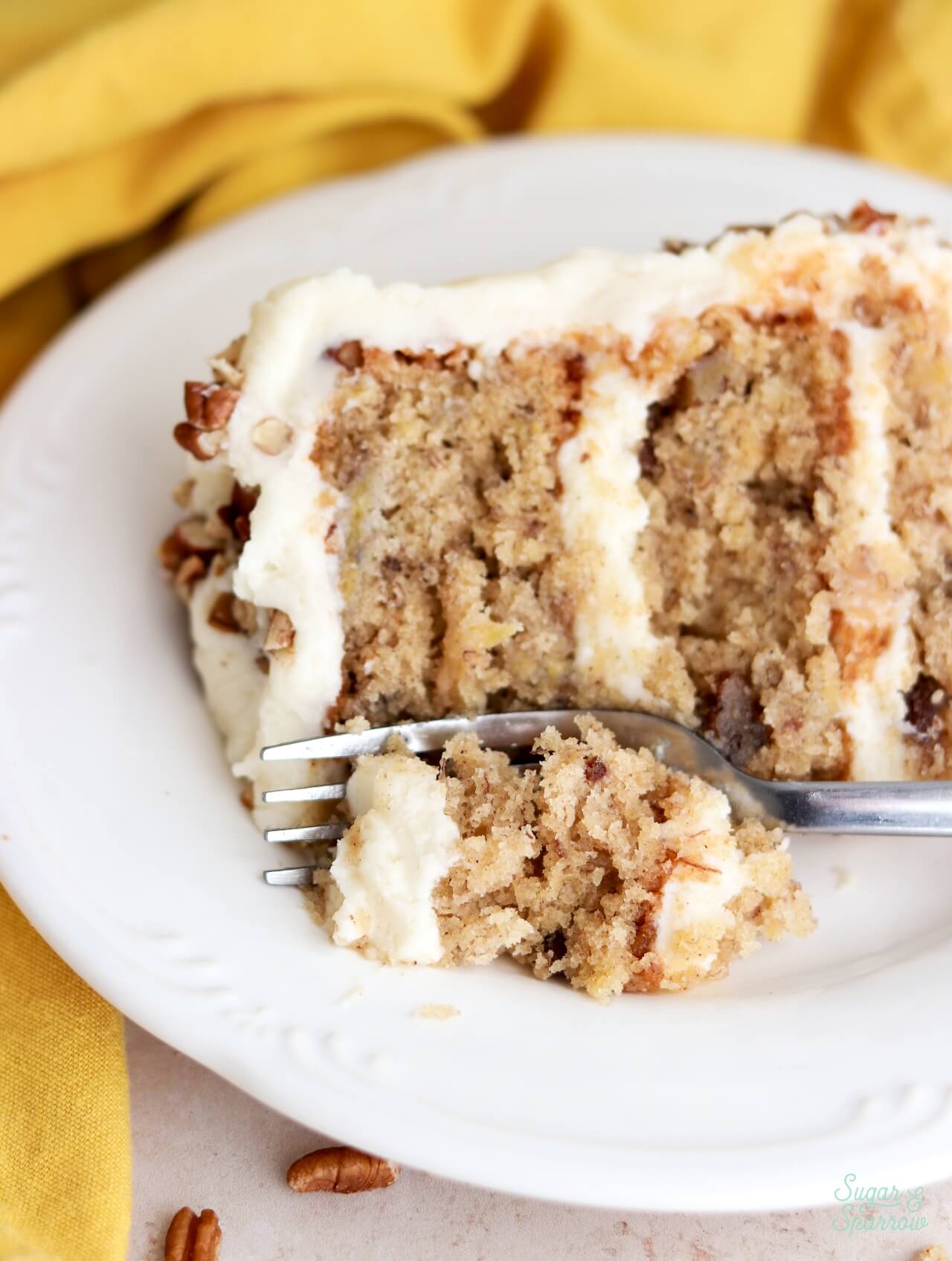 hummingbird cake slice on a plate