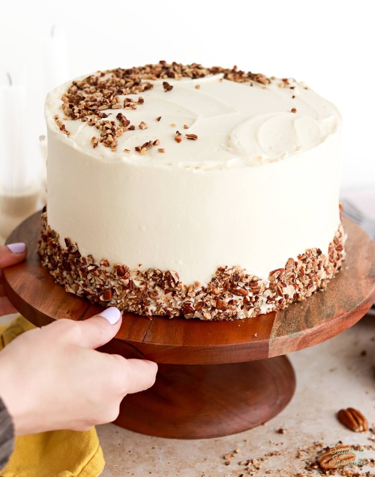 hummingbird cake with cream cheese frosting and toasted pecans