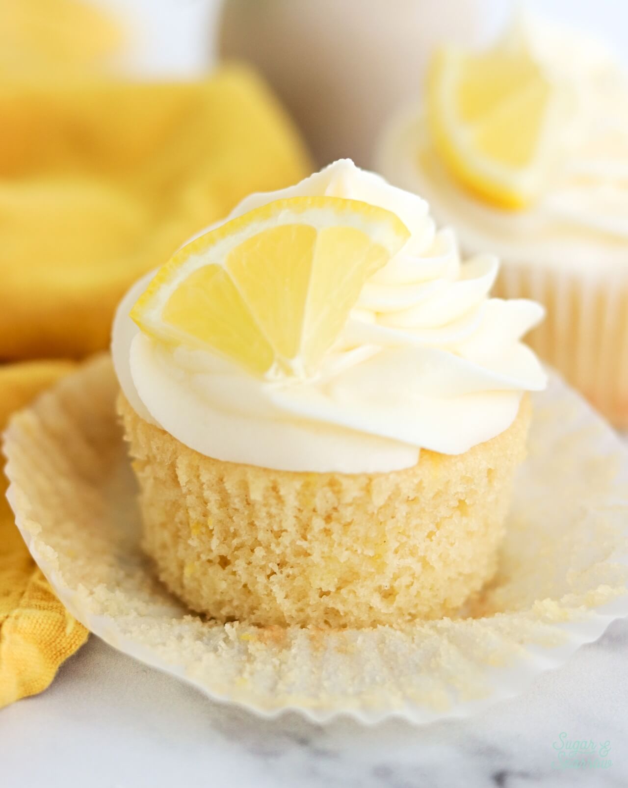 homemade lemon cupcakes with lemon cream cheese buttercream
