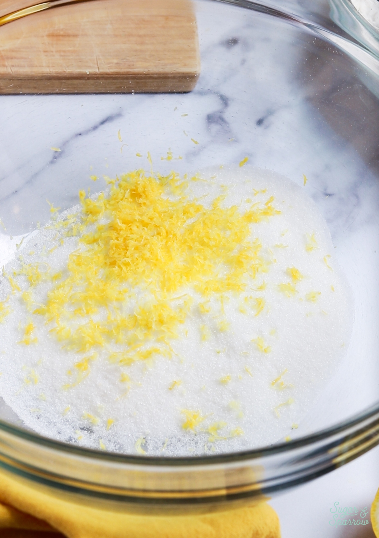 blending lemon zest into sugar