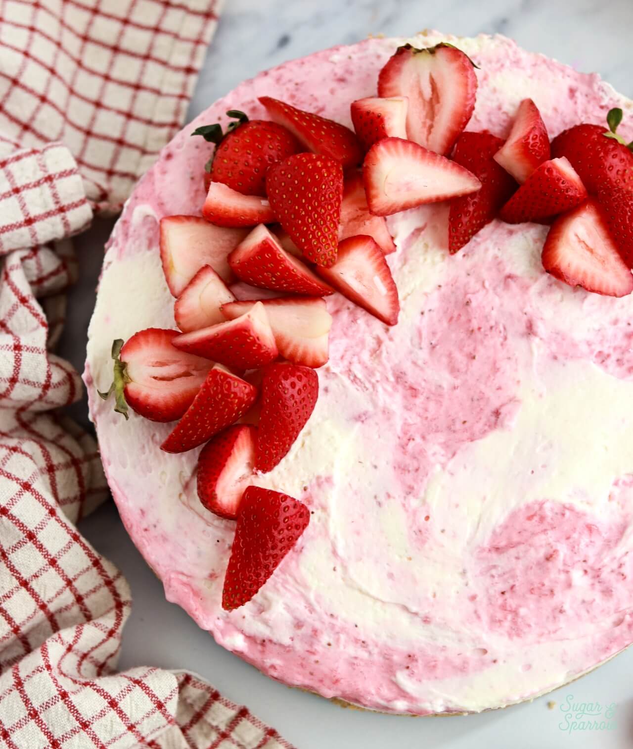 no-bake cheesecake with strawberry swirl