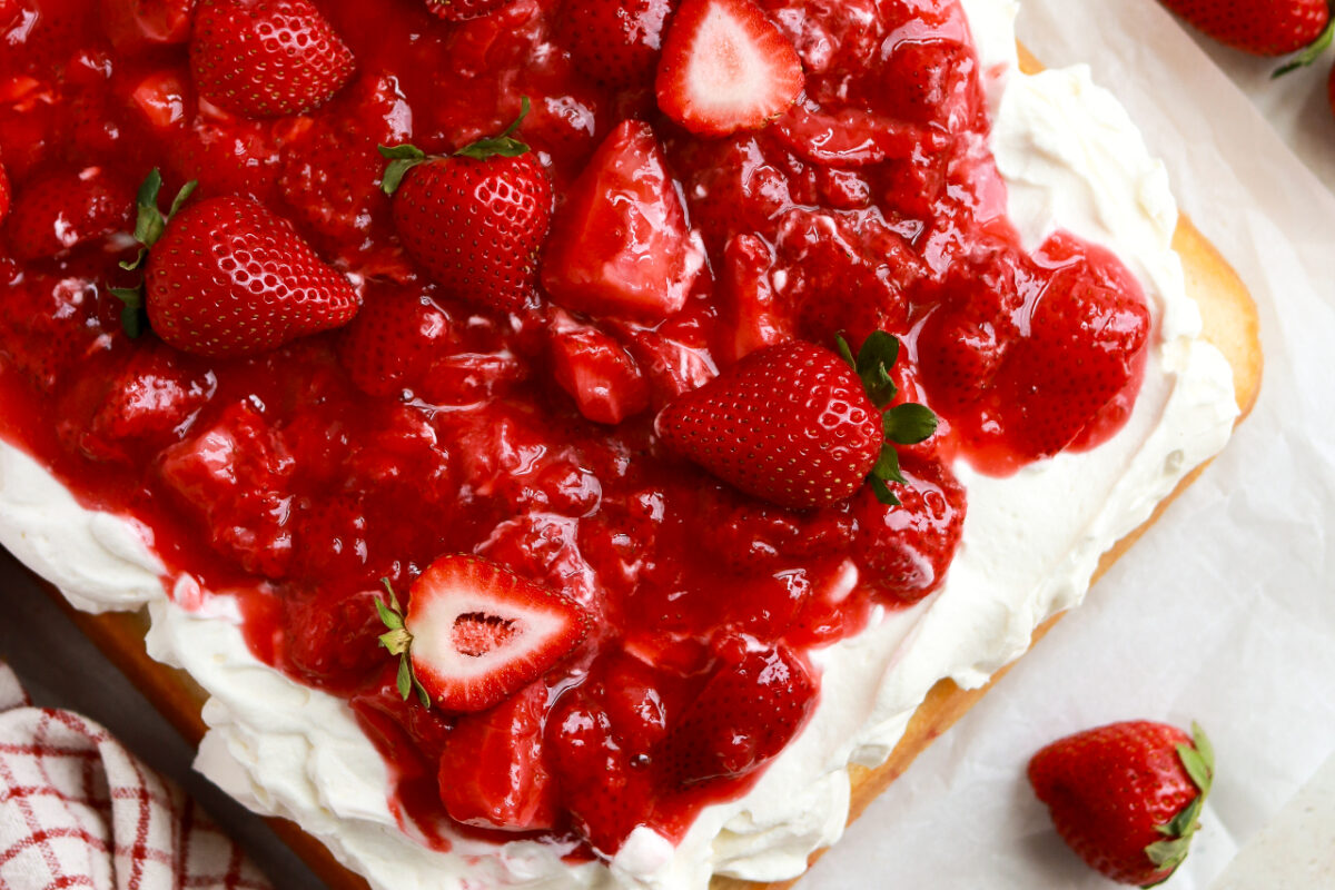 strawberry shortcake sheet cake baked in a 9x13 pan