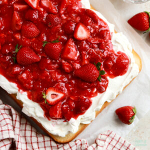 strawberry shortcake sheet cake baked in a 9x13 pan