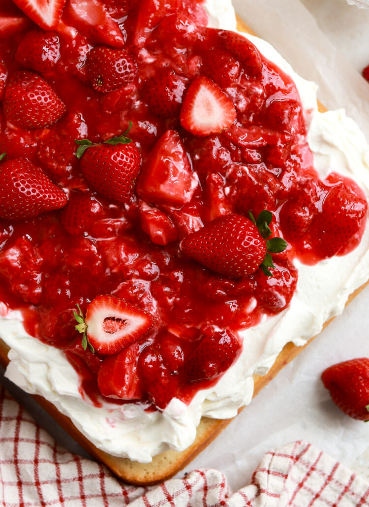 strawberry shortcake sheet cake baked in a 9x13 pan
