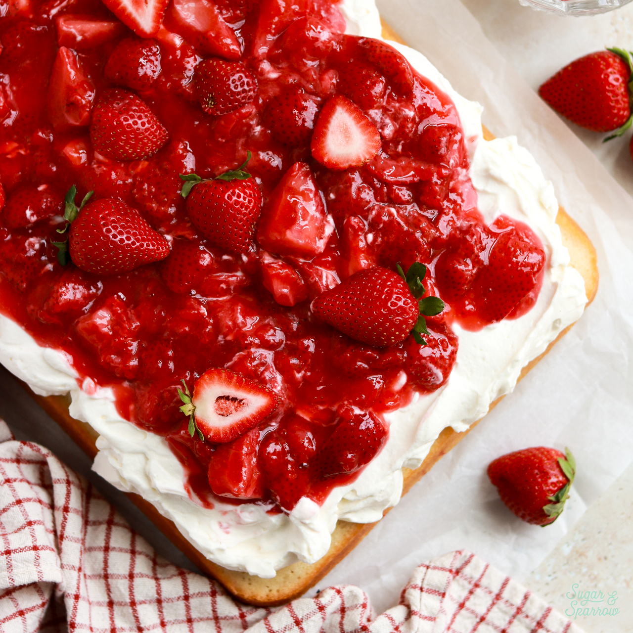strawberry shortcake sheet cake baked in a 9x13 pan