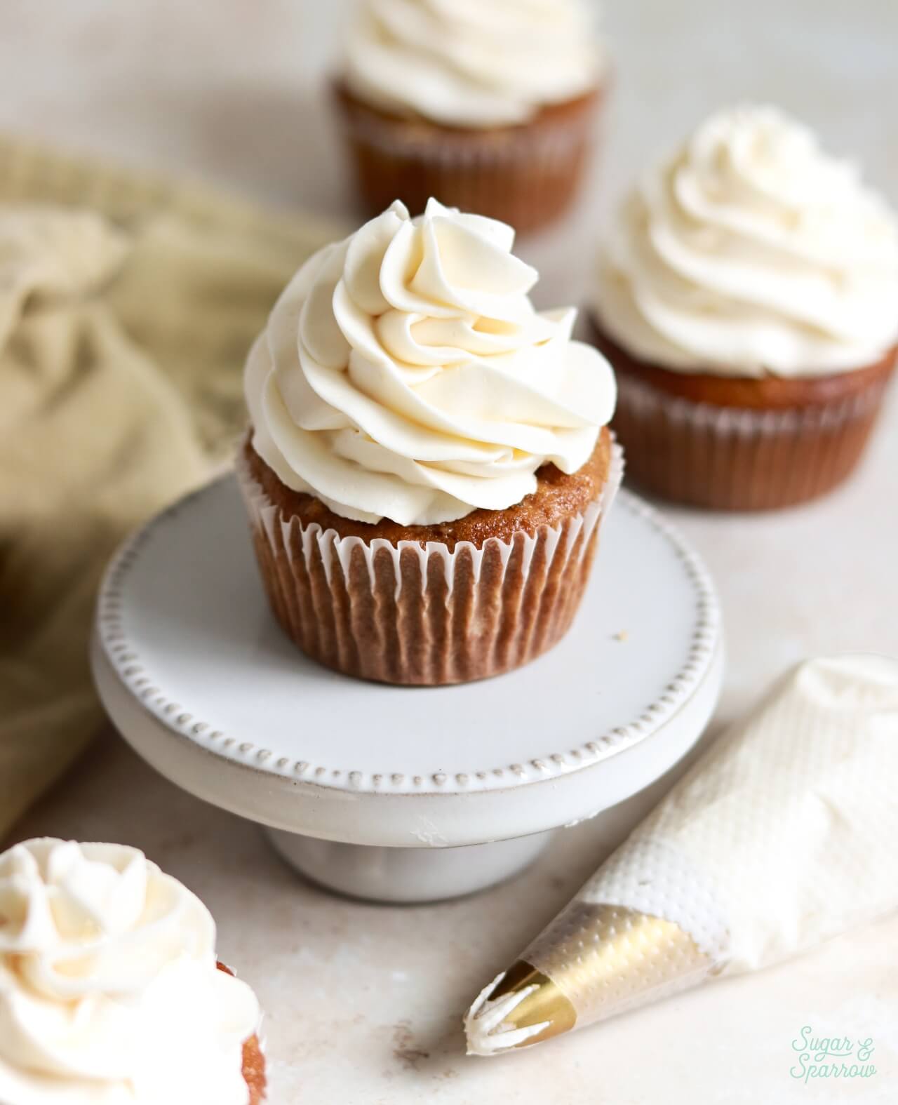 whipped cream frosting with mascarpone on cupcakes