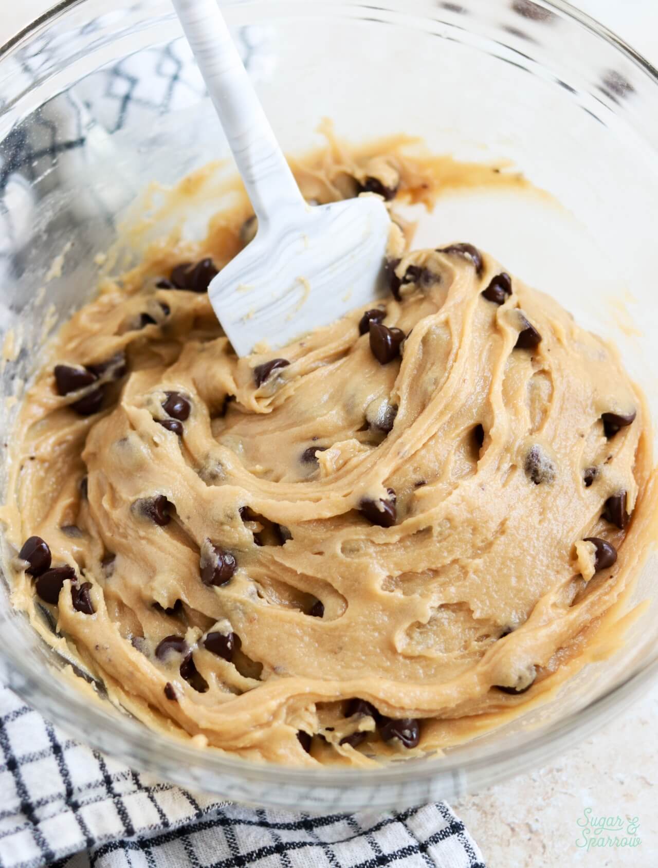 chocolate chip cookie dough in a glass bowl