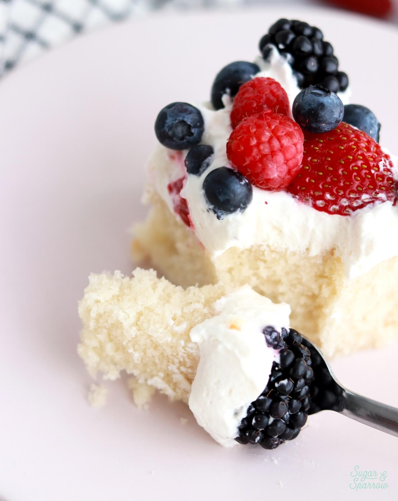 berries and cream sheet cake slice