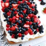 berries and cream sheet cake by sugar and sparrow