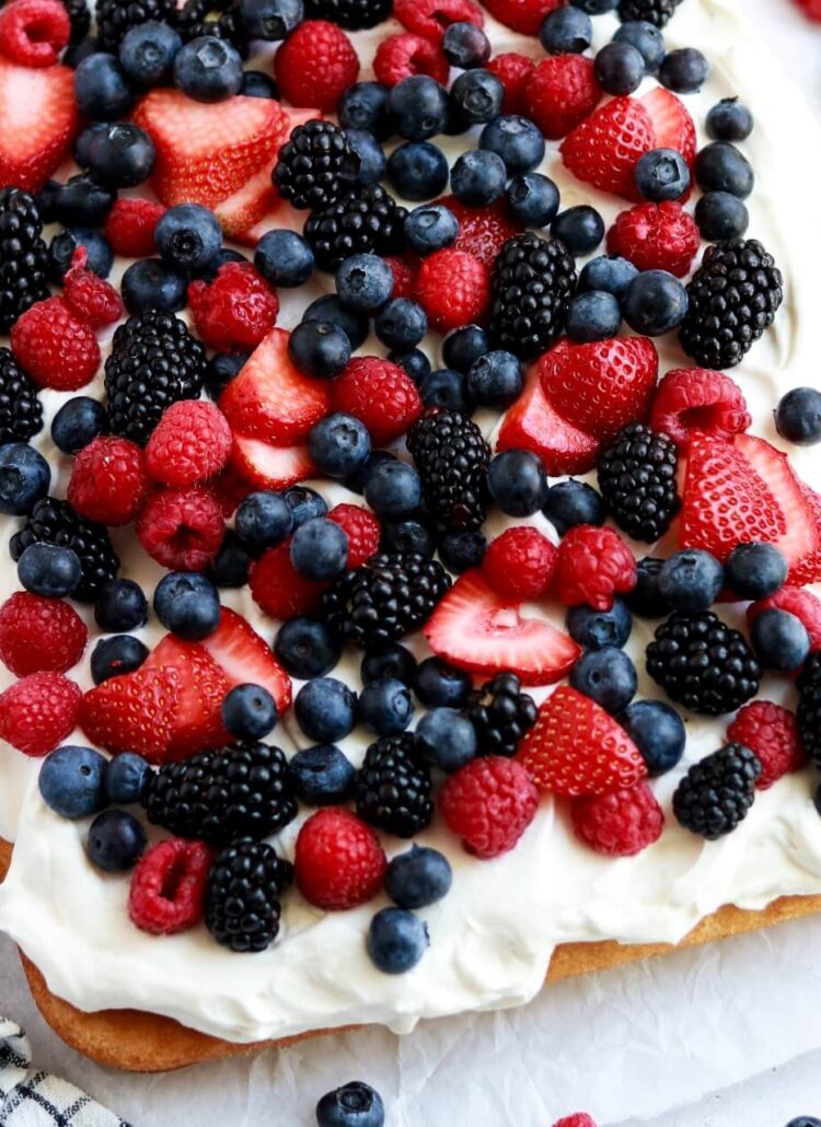 berries and cream sheet cake by sugar and sparrow