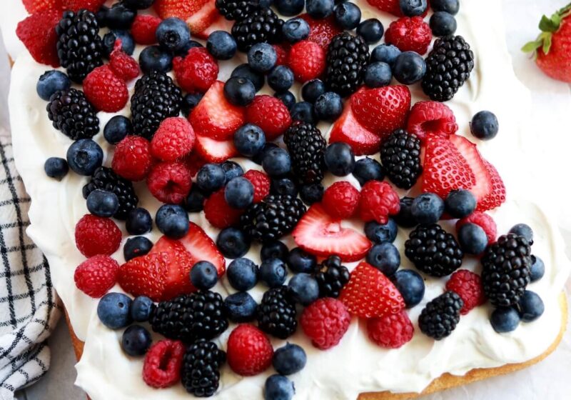berries and cream sheet cake by sugar and sparrow