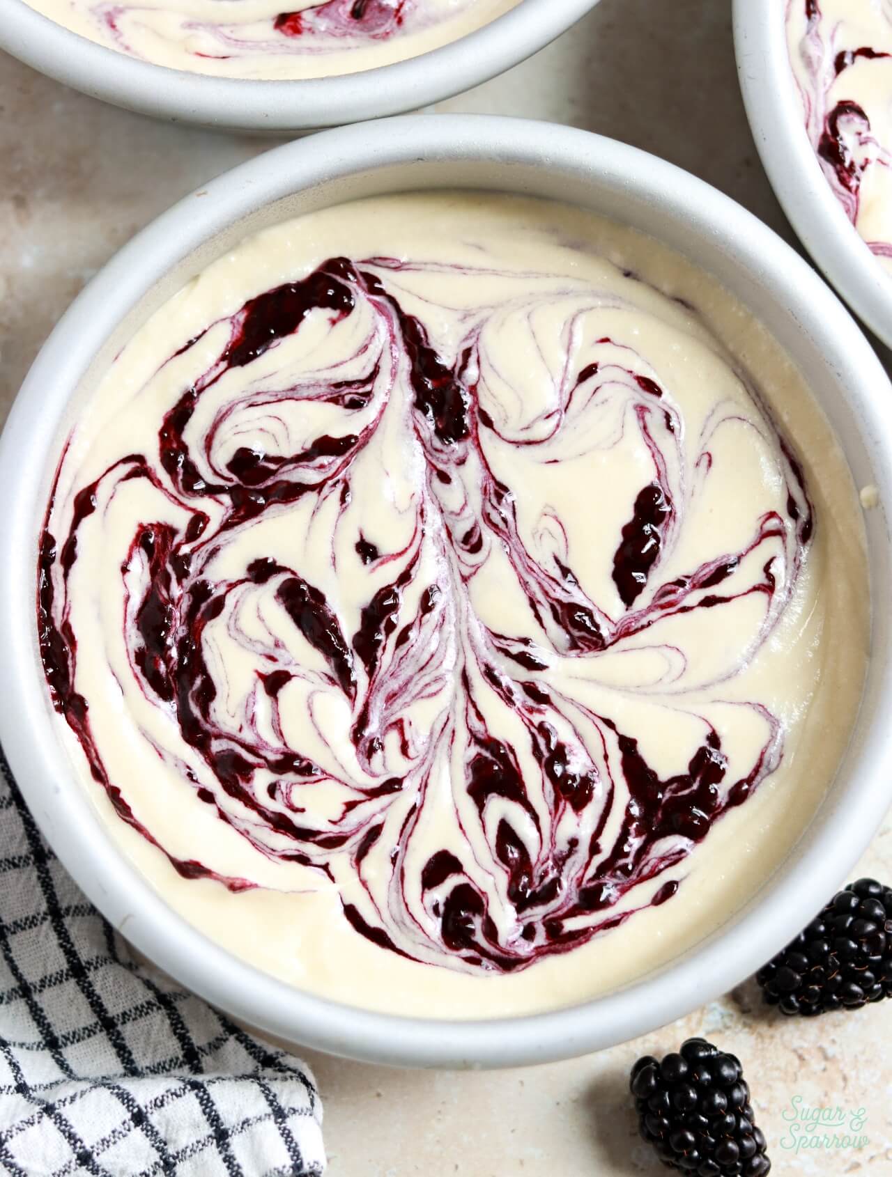 vanilla cake batter swirled with blackberry puree