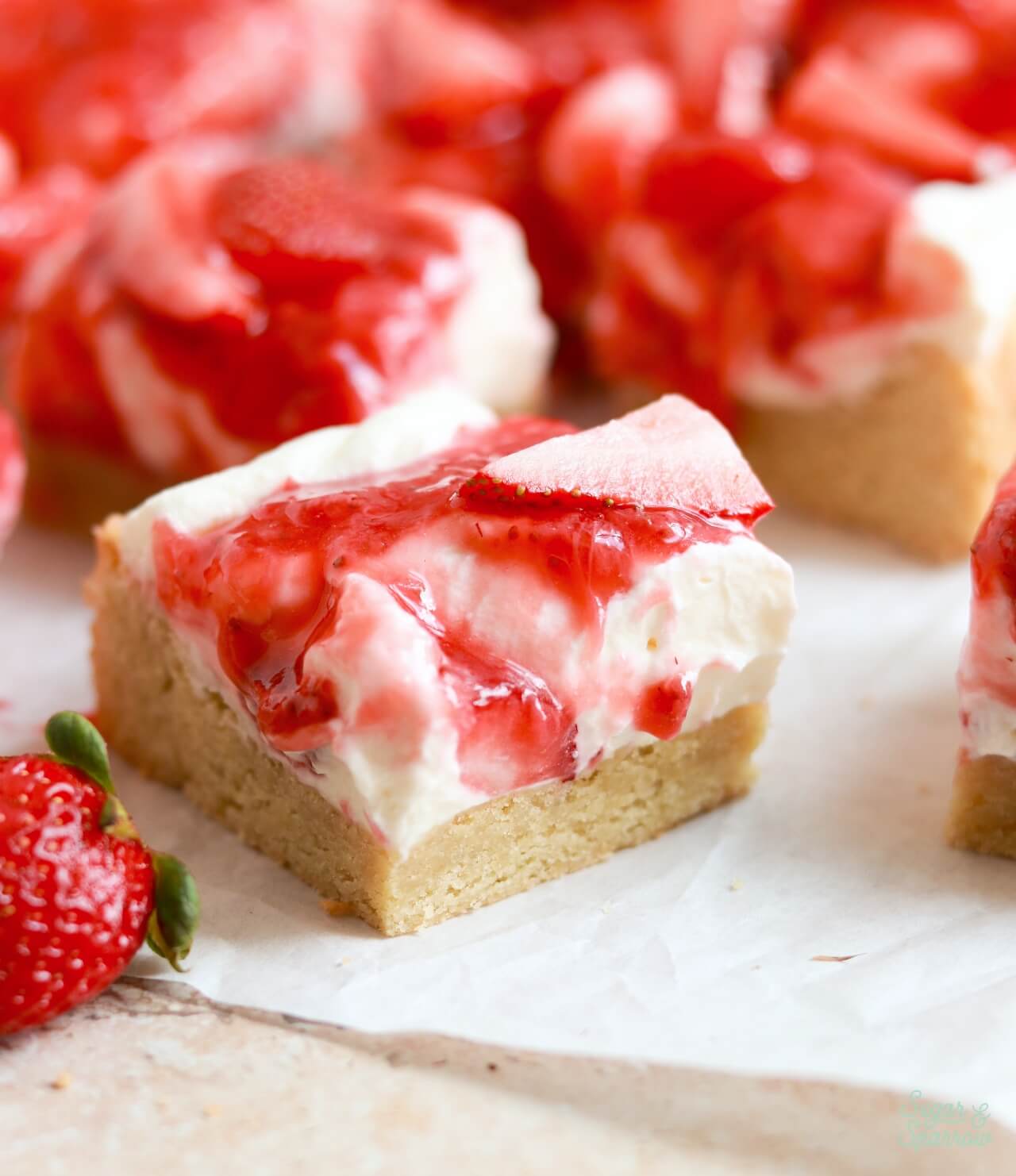 strawberry shortcake frosted sugar cookie bars