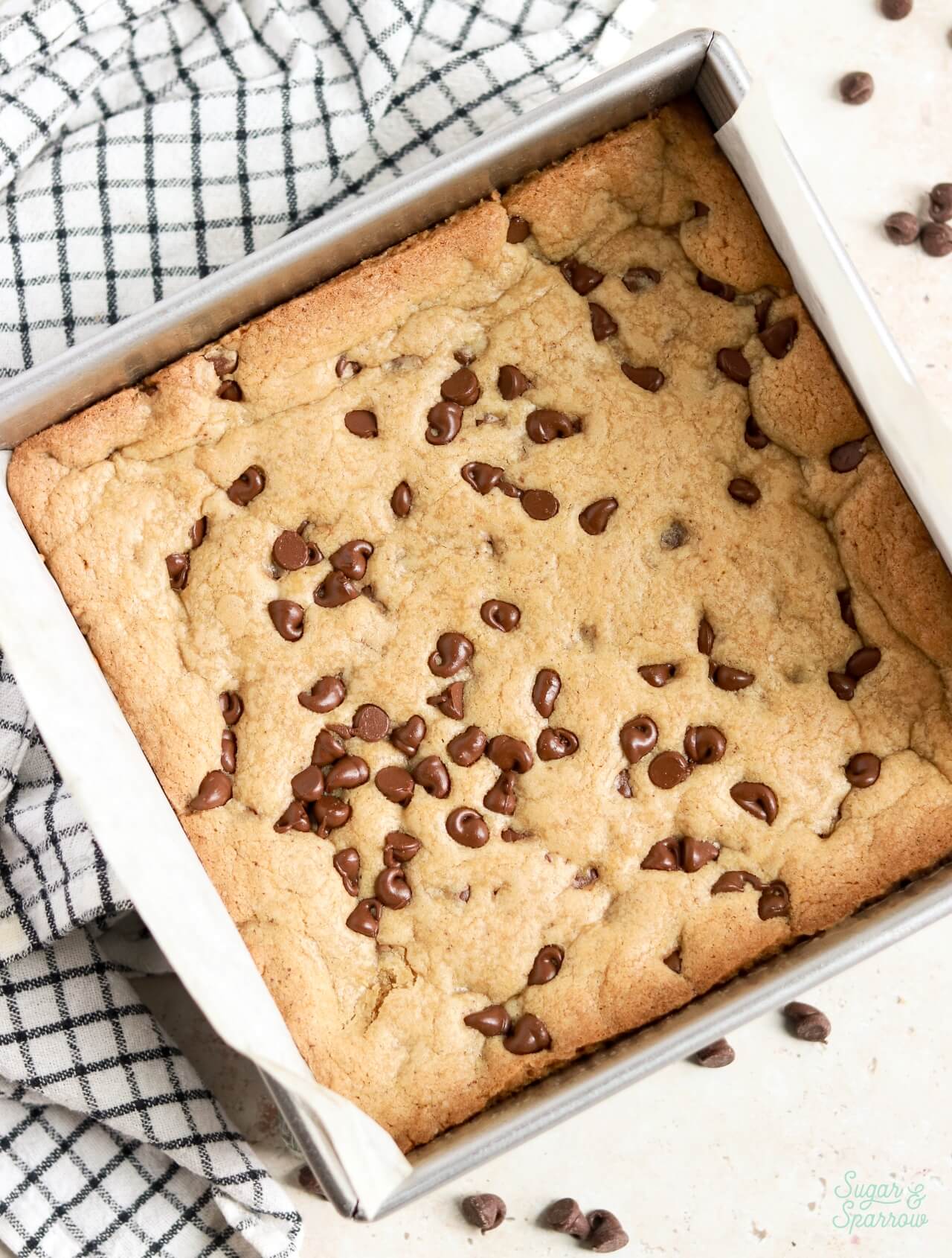 brown butter chocolate chip cookie bars in 8-inch pan