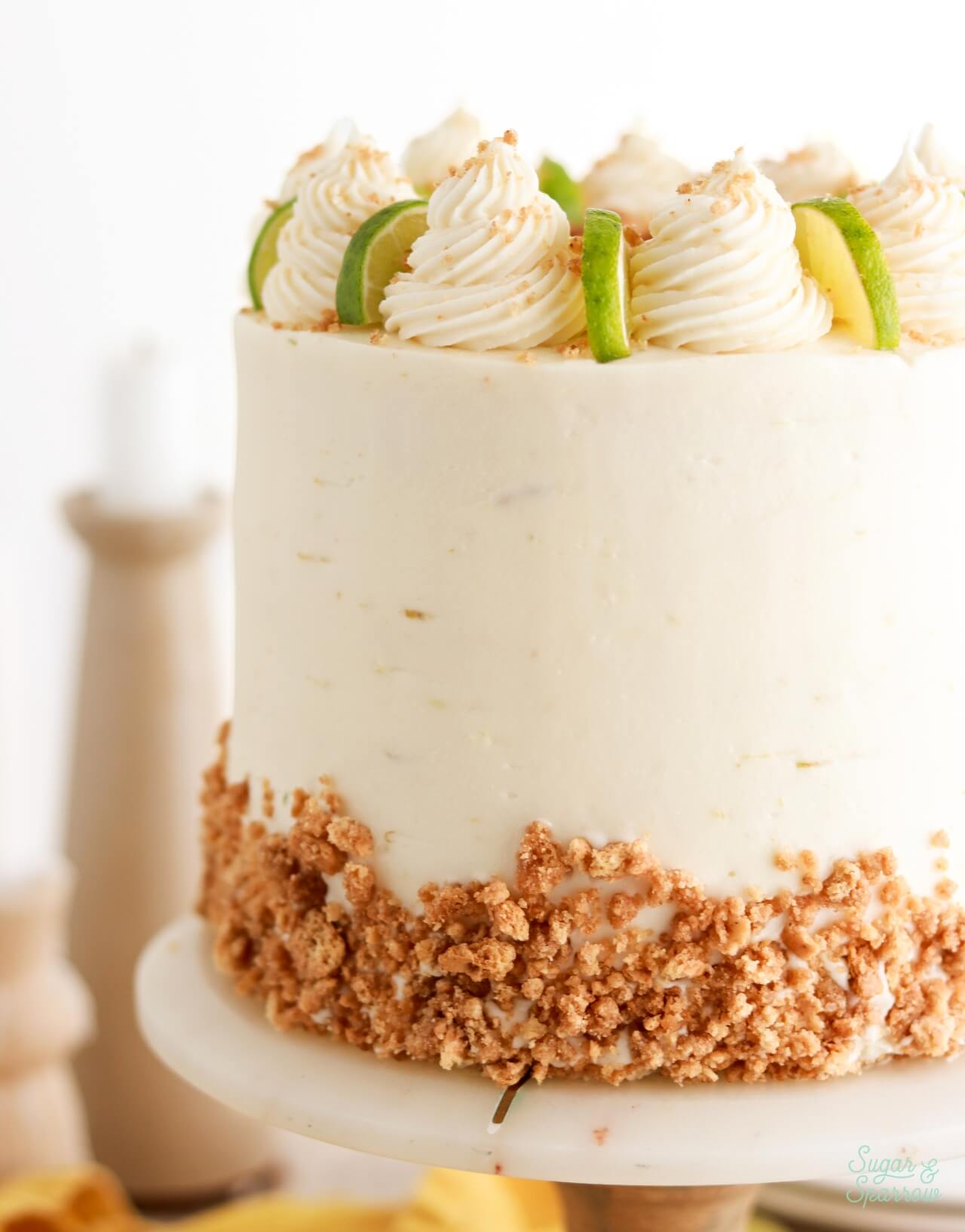 key lime pie cake with key lime buttercream and graham cracker crumble