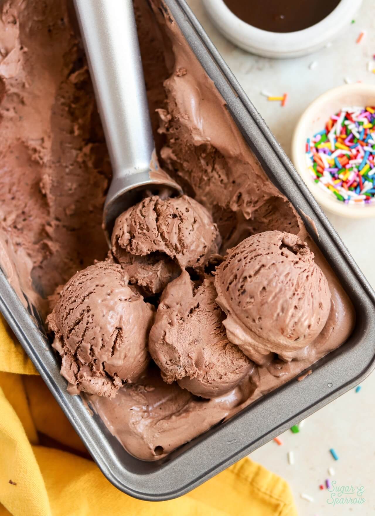 easy no churn chocolate ice cream recipe with melted chocolate and cocoa powder