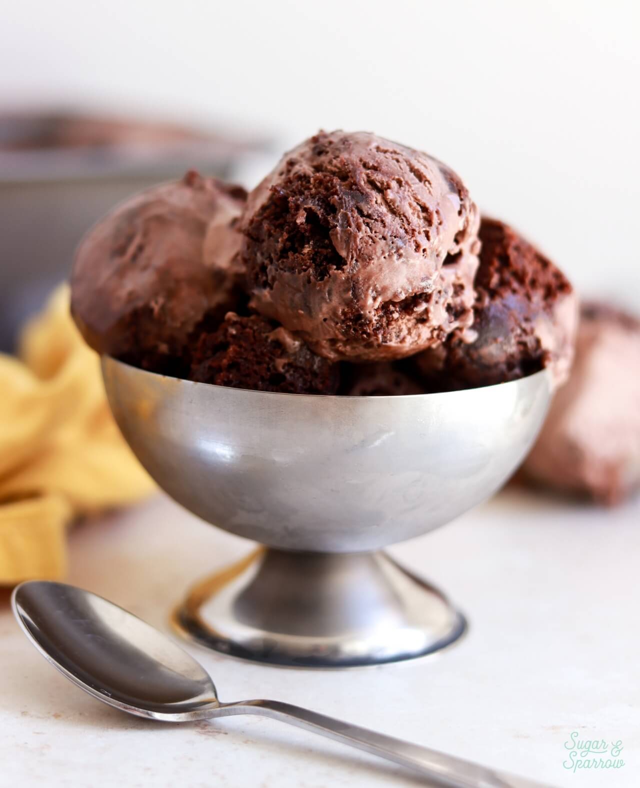 No churn chocolate brownie ice cream in a silver dish