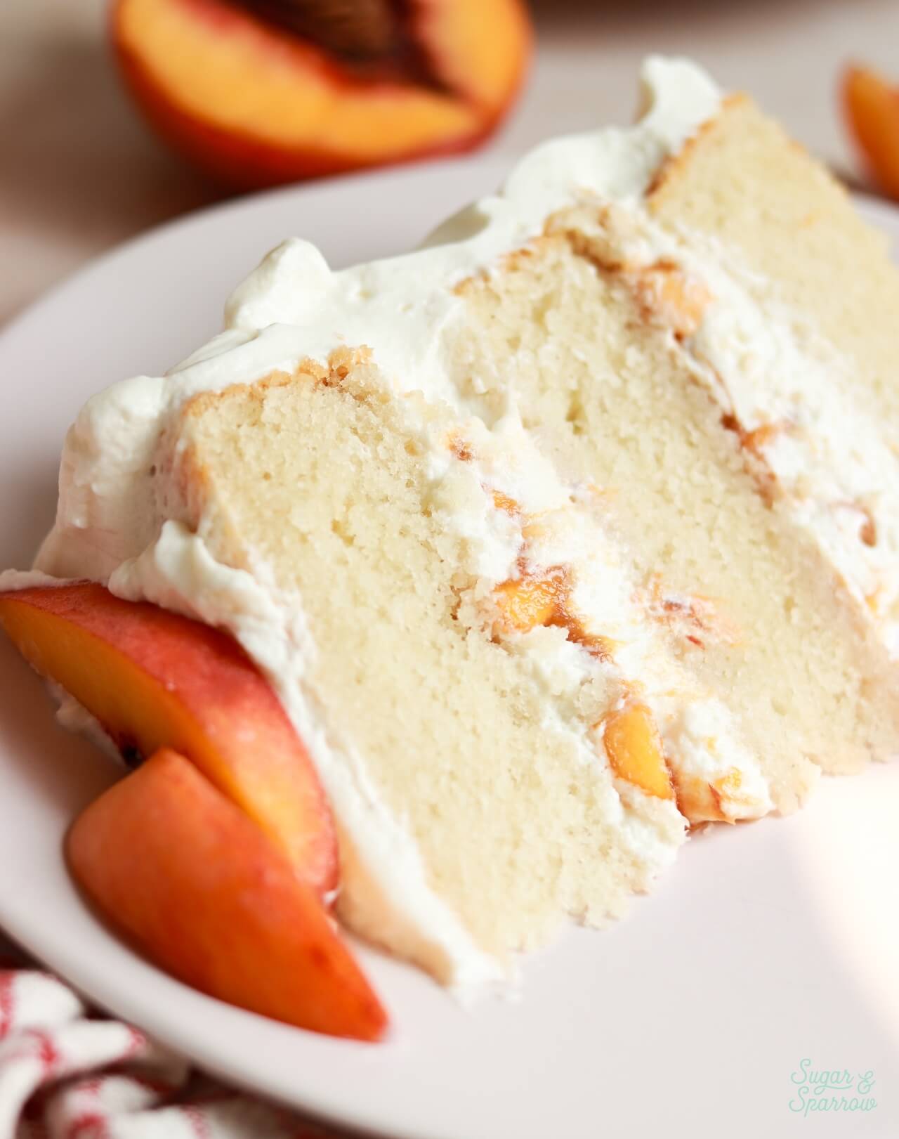 peaches and cream cake with fresh peaches