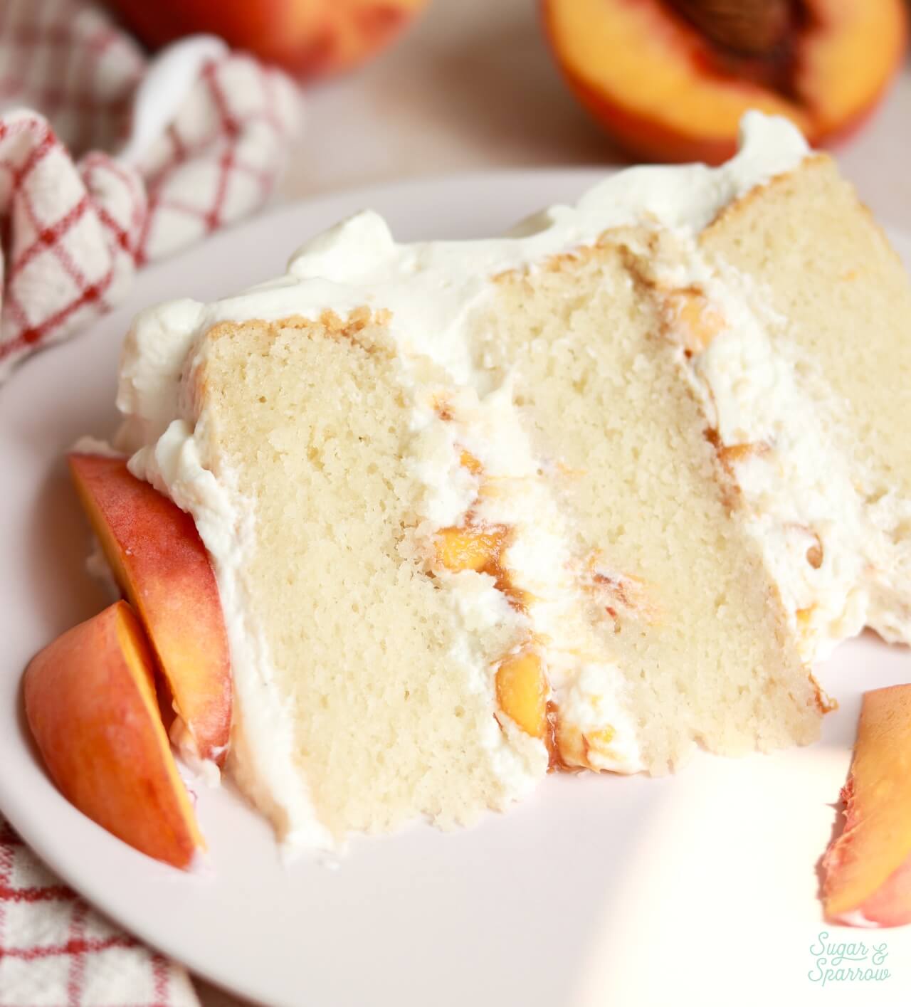 slice of peaches and cream cake