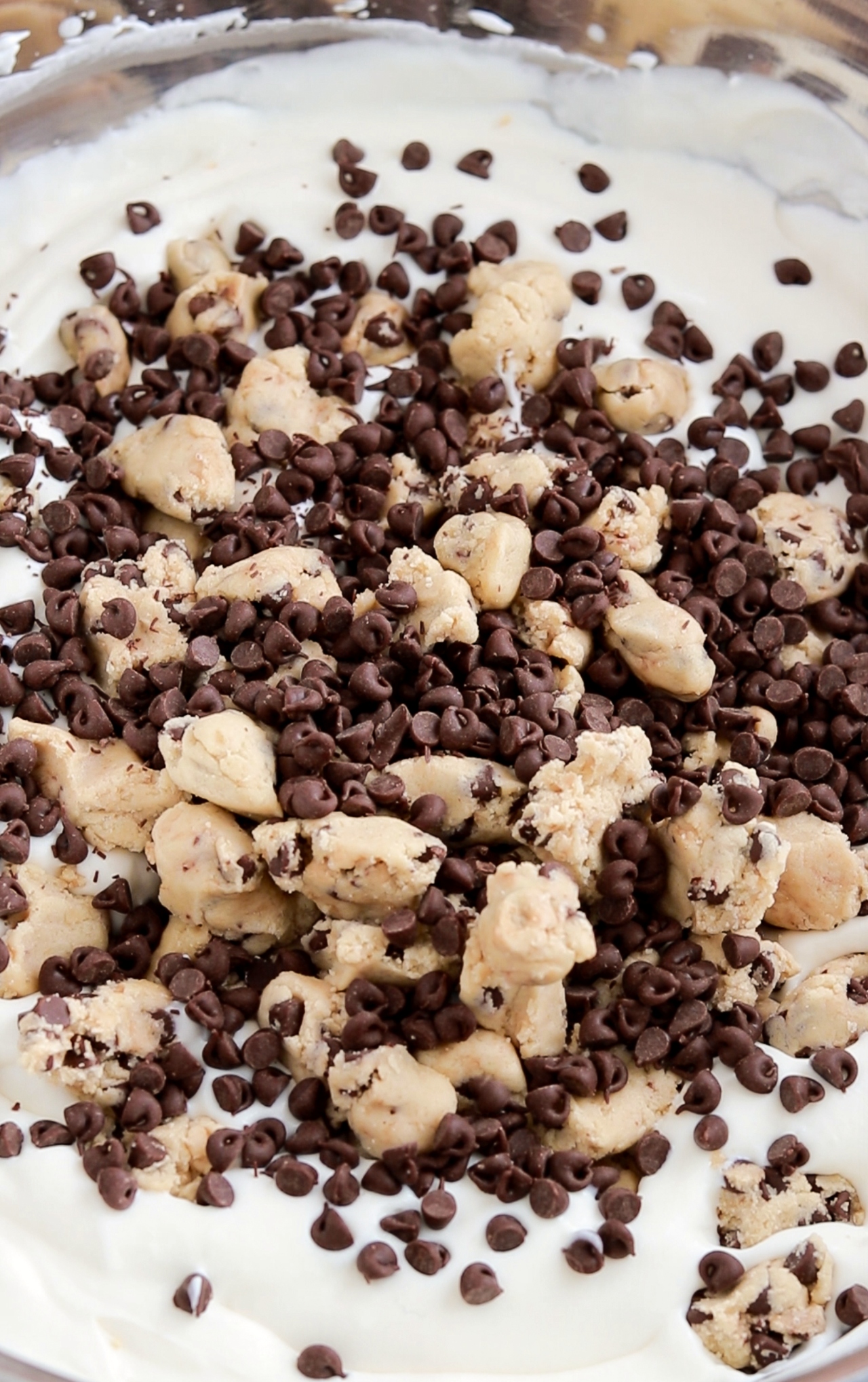 adding cookie dough chunks to no churn vanilla ice cream