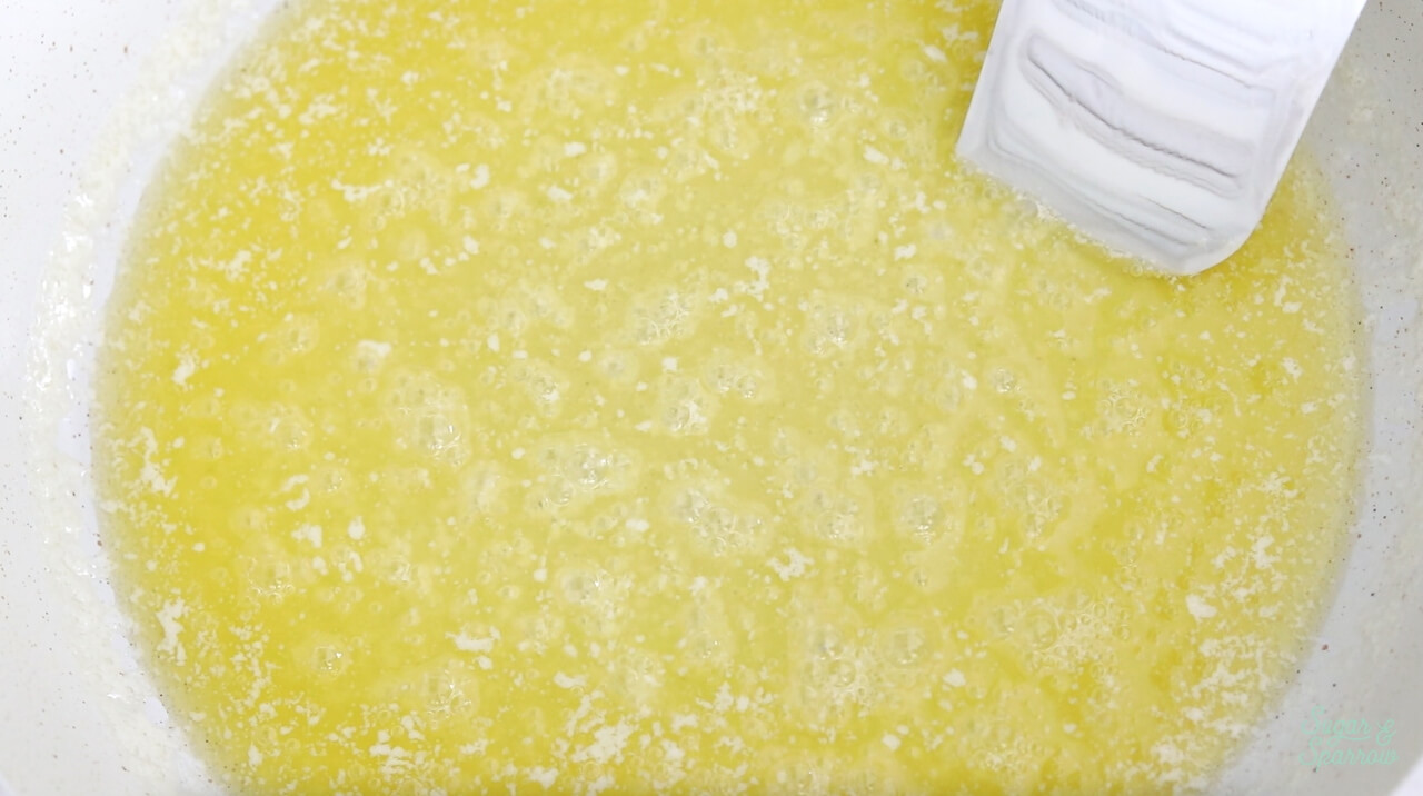 Milk solids separating from butter in brown butter