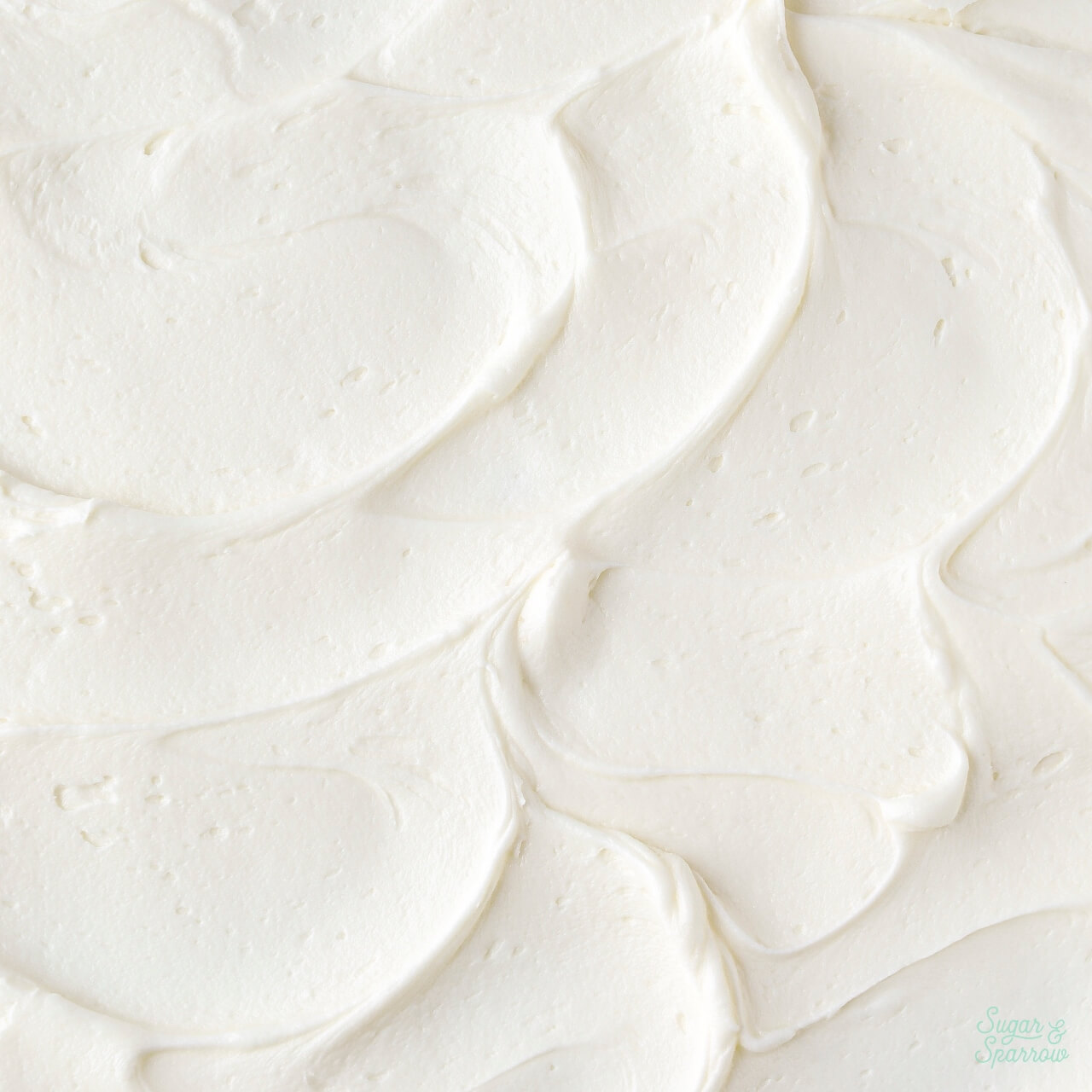 vanilla buttercream for layer cakes recipe by sugar and sparrow